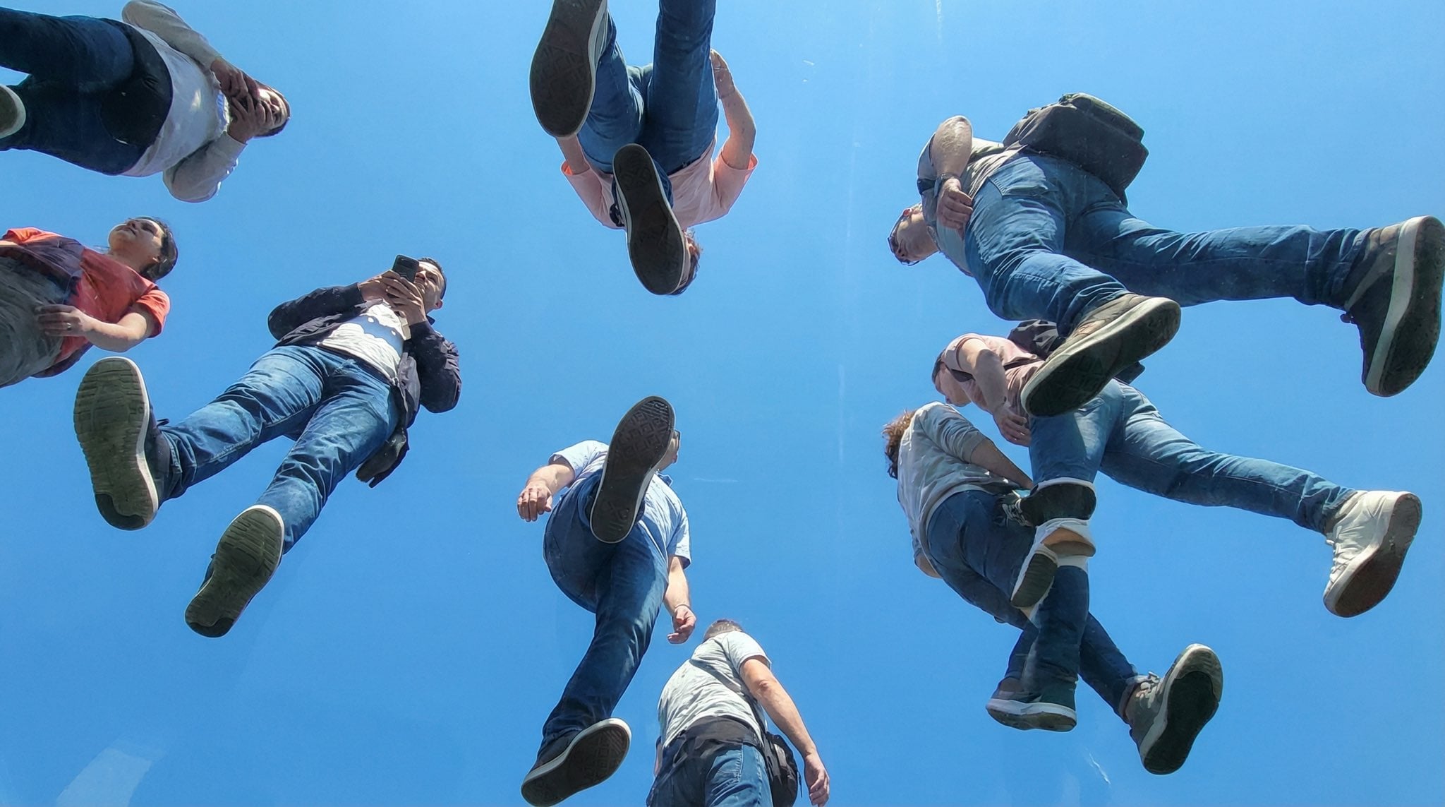 View from under a plane of completely transparent plexiglass. We are looking str