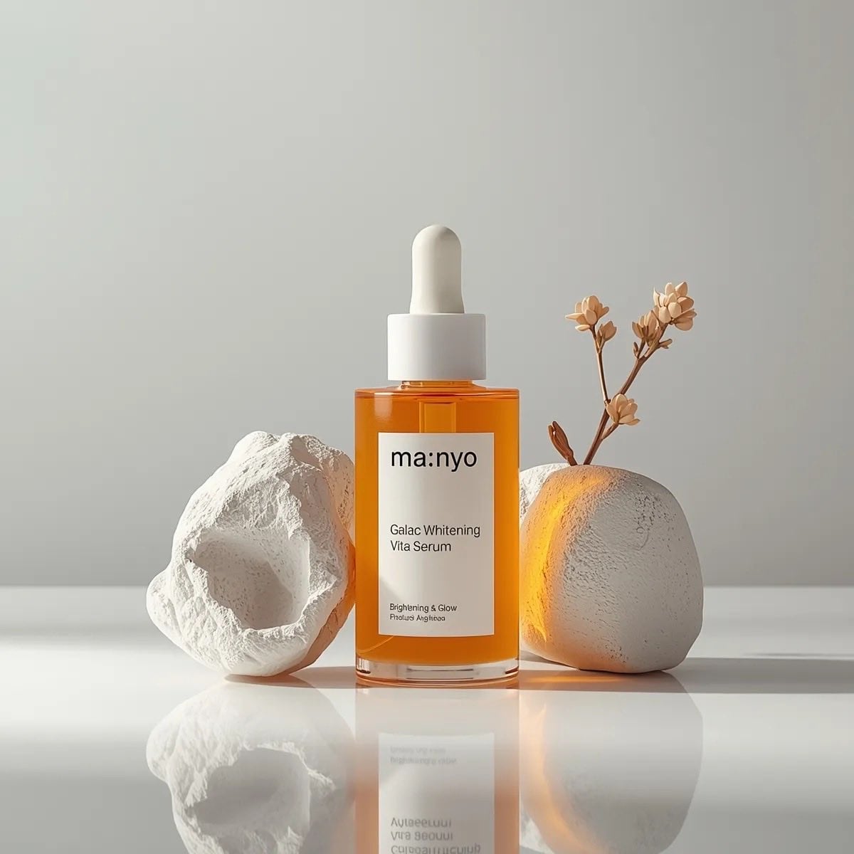 Minimalist studio product photography of an amber glass dropper serum bottle wit