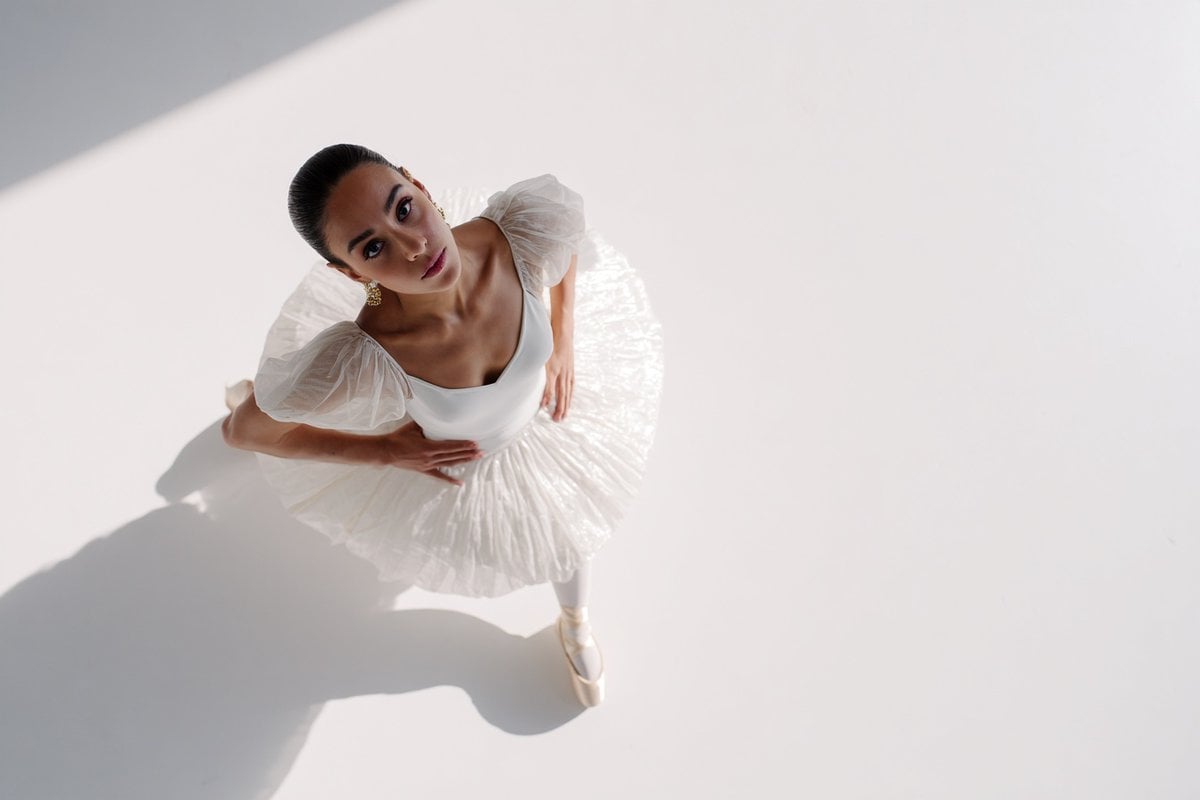 A [subject] photographed from a 35-degree overhead angle, standing alone in an o