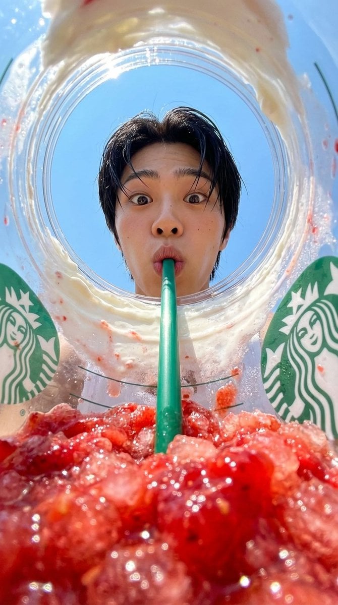 {
  "prompt": "View from inside a Starbucks strawberry frappuccino cup looking u