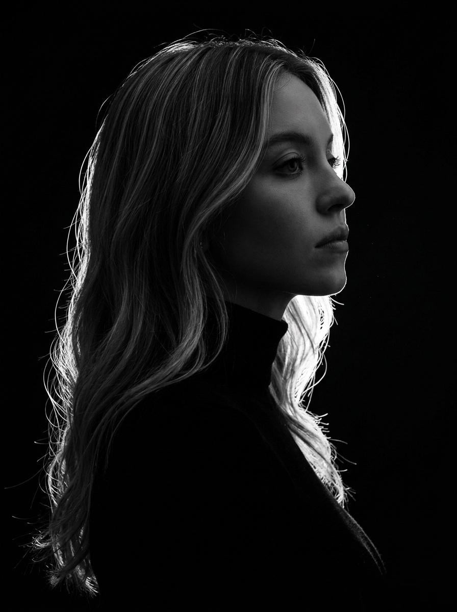 A minimalist black and white cinematic portrait featuring two individuals (male 
