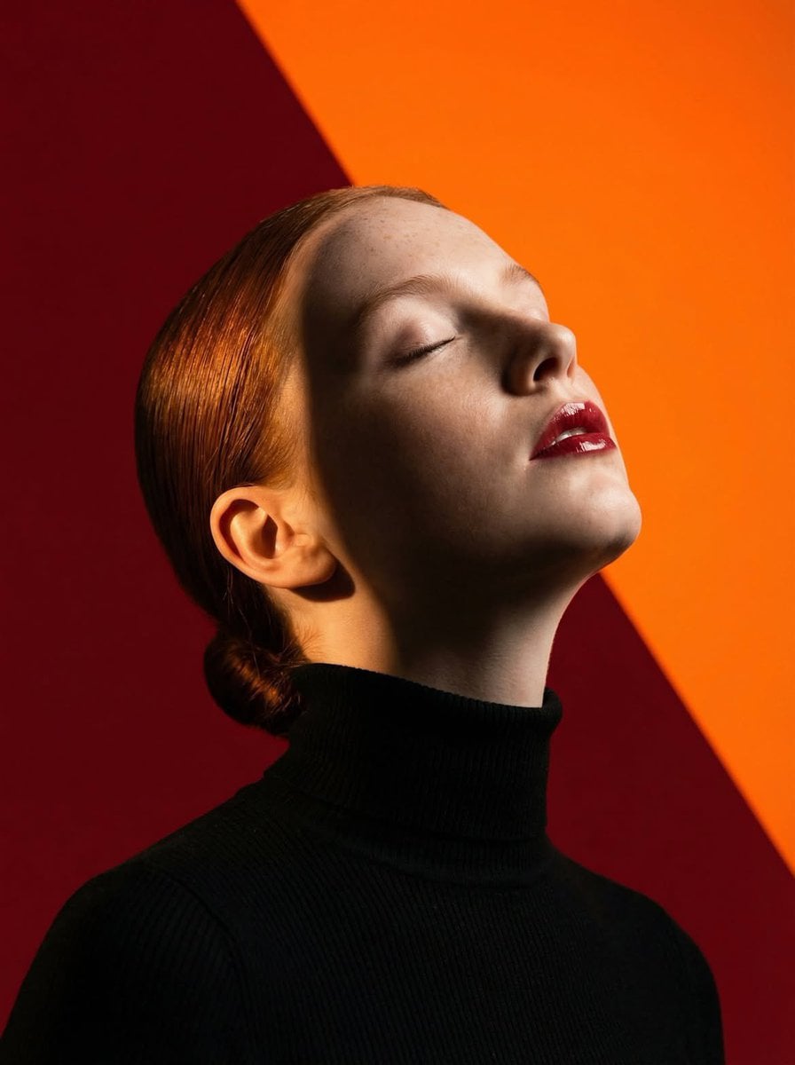 Ultra-high-fashion editorial beauty portrait of a fair-skinned female model with