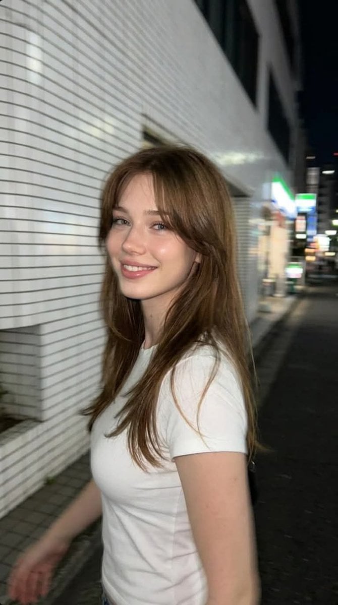 Ultra-realistic candid smartphone photograph, 9:16 vertical.

Use the attached i