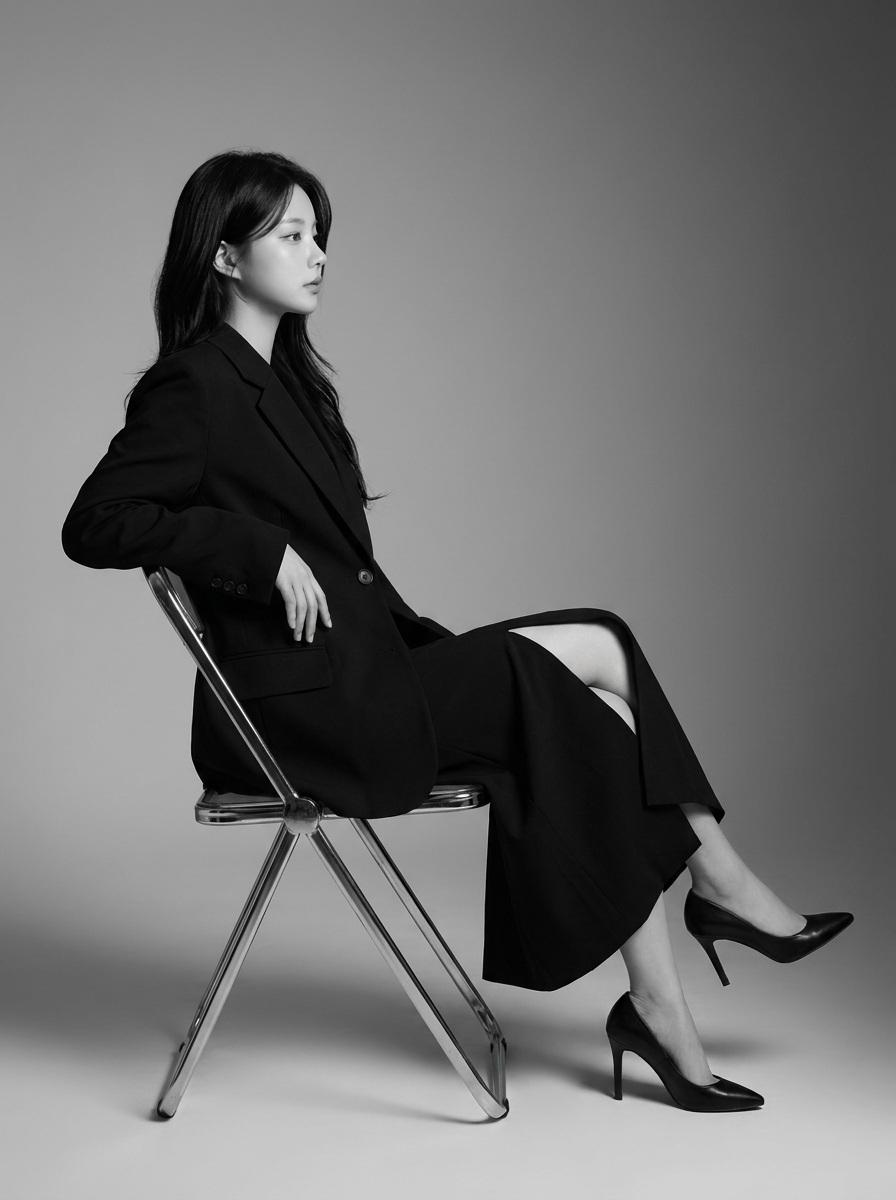 Create a highly realistic 8K professional black-and-white fashion editorial port