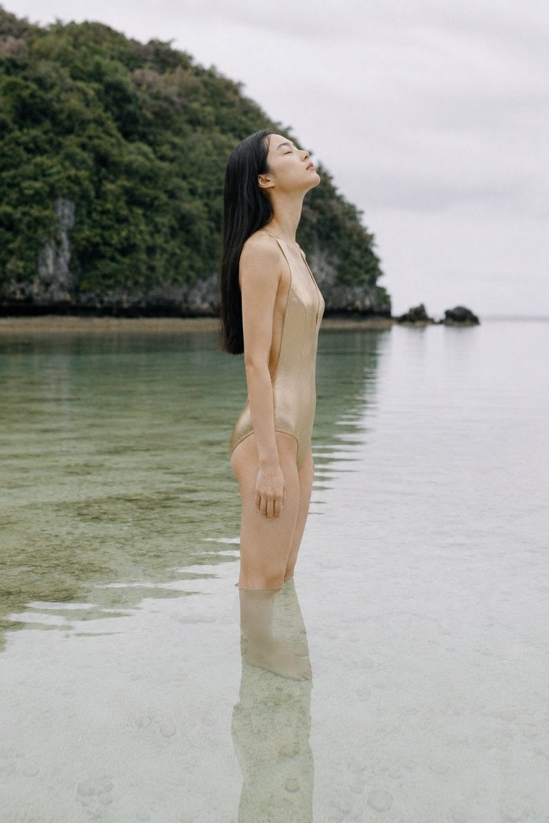 A conceptual fashion editorial, full body, Sony A9 III and 105mm f/2.0, eye-leve