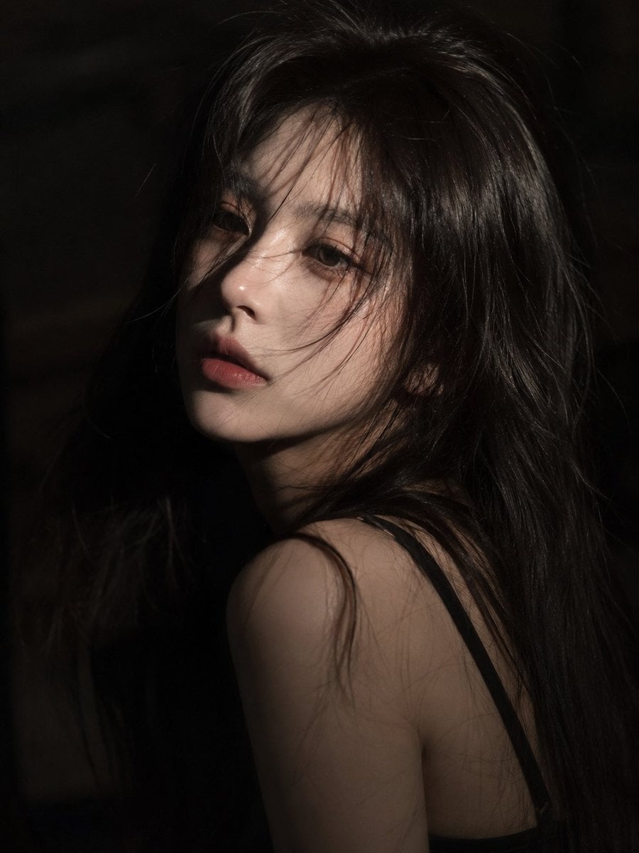 an ultra-realistic cinematic close-up portrait of a young East Asian woman. She 