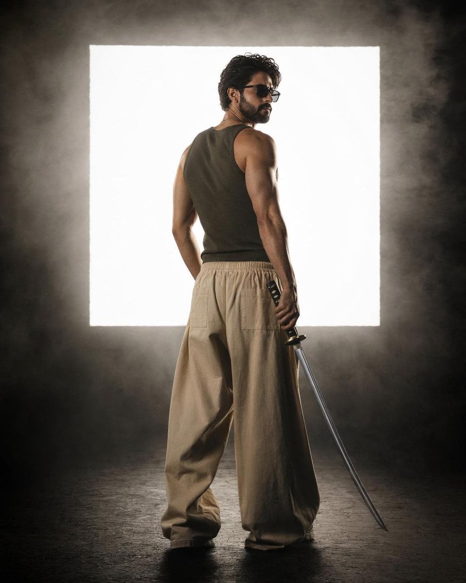 Full-body cinematic studio portrait of an athletic man From reference image stan